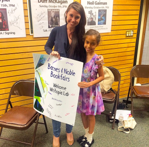 The author with her student after a Barnes & Noble reading. Photo by student's father. 