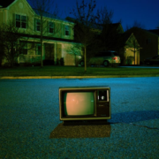Television in the middle of a suburban street