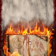 photo of a book with a drawing of a pentagram and of Satan as a goat, burning in flames.
