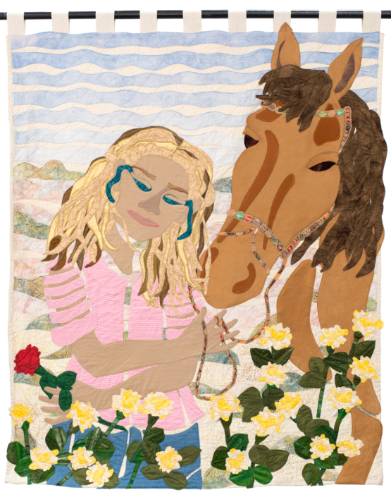 Person in pink shirt with horse