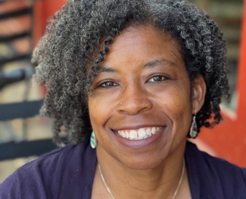 Author Valerie Nyberg smiles at the camera