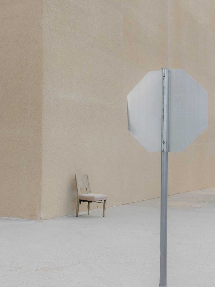 sign and chair, archival natural pigment print on Italian cotton rag, dimensions variable, 2019